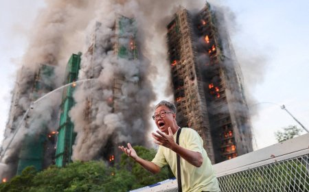 ‘Very worried’: Hong Kong fire survivors hunt for the missing