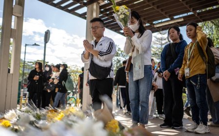 Hong Kong mourns victims of blaze that killed 128 and counting