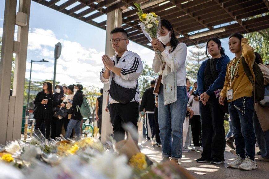 Hong Kong mourns victims of blaze that killed 128 and counting