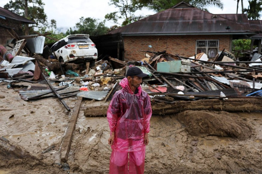 Race to get aid to Asia flood survivors as toll tops 1,200