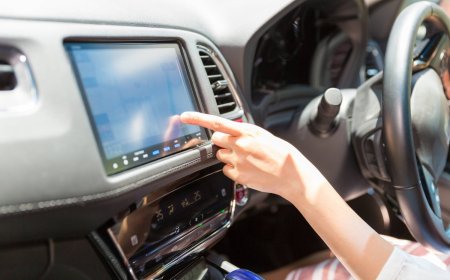 Why do female voices dominate automated guidance in Japan?