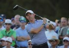 McIlroy falters, shares Masters lead with surging Young