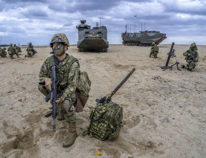 In major policy shift, Japan scraps limits on lethal arms exports