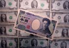 Yen falls to pre-intervention levels after solid U.S. jobs data