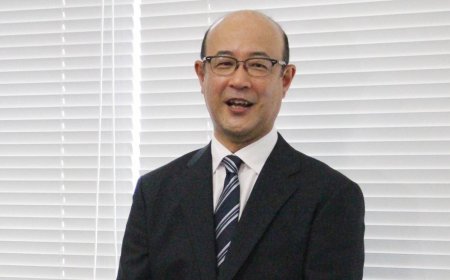 New Toyota president vows to maintain development policy