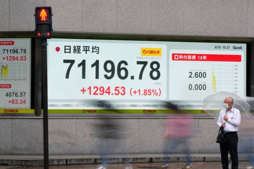 Yen hits 23-month low and Nikkei 225 breaks 71,000 for first time